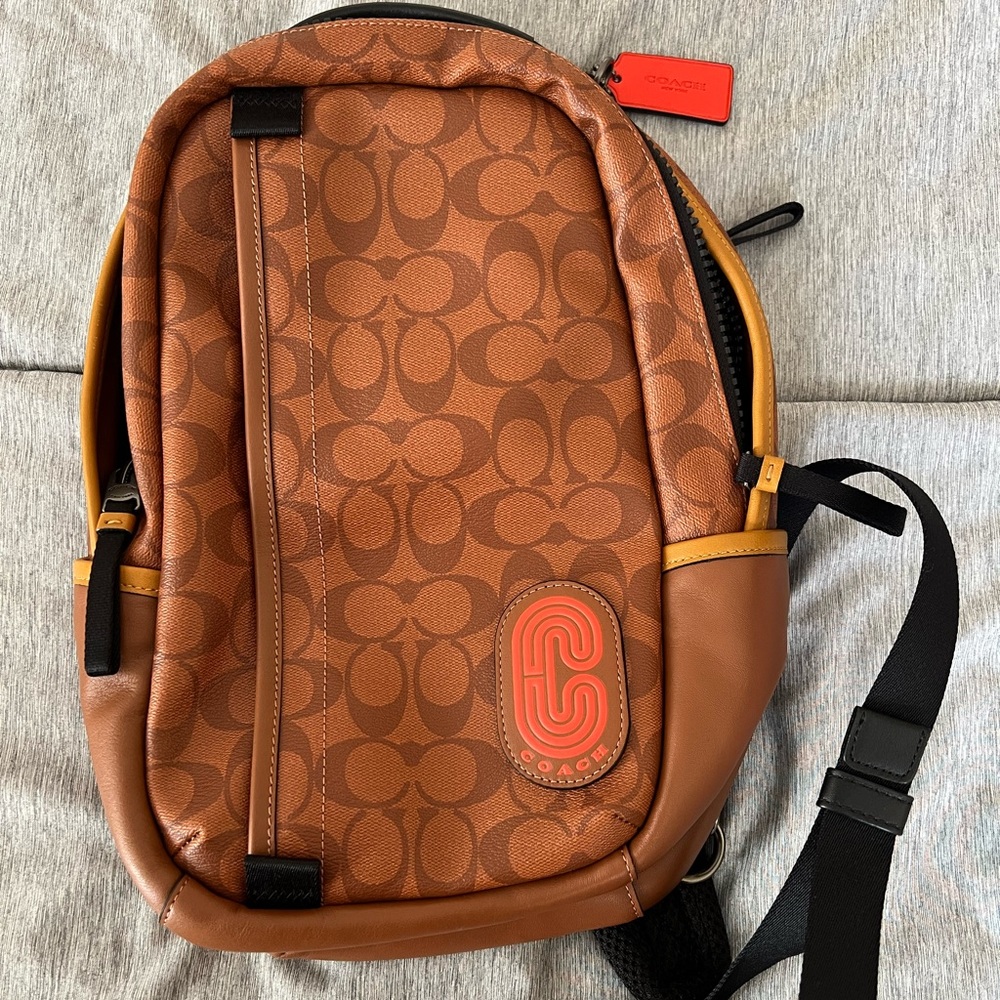COACH Unisex Sling Backpack Brown